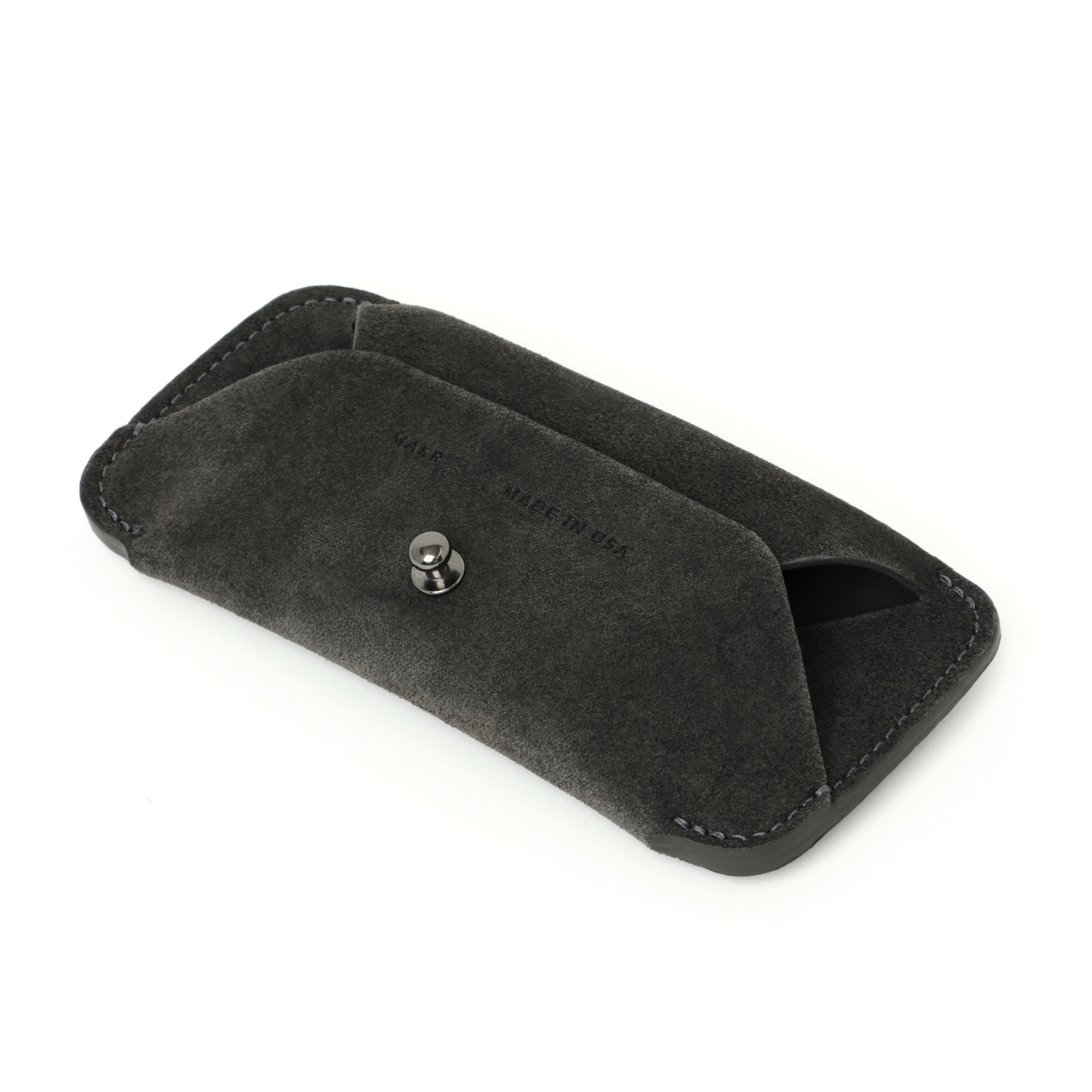 Angled side view of the MAKR Eyewear Sleeve V2 in Lead Horween suede.