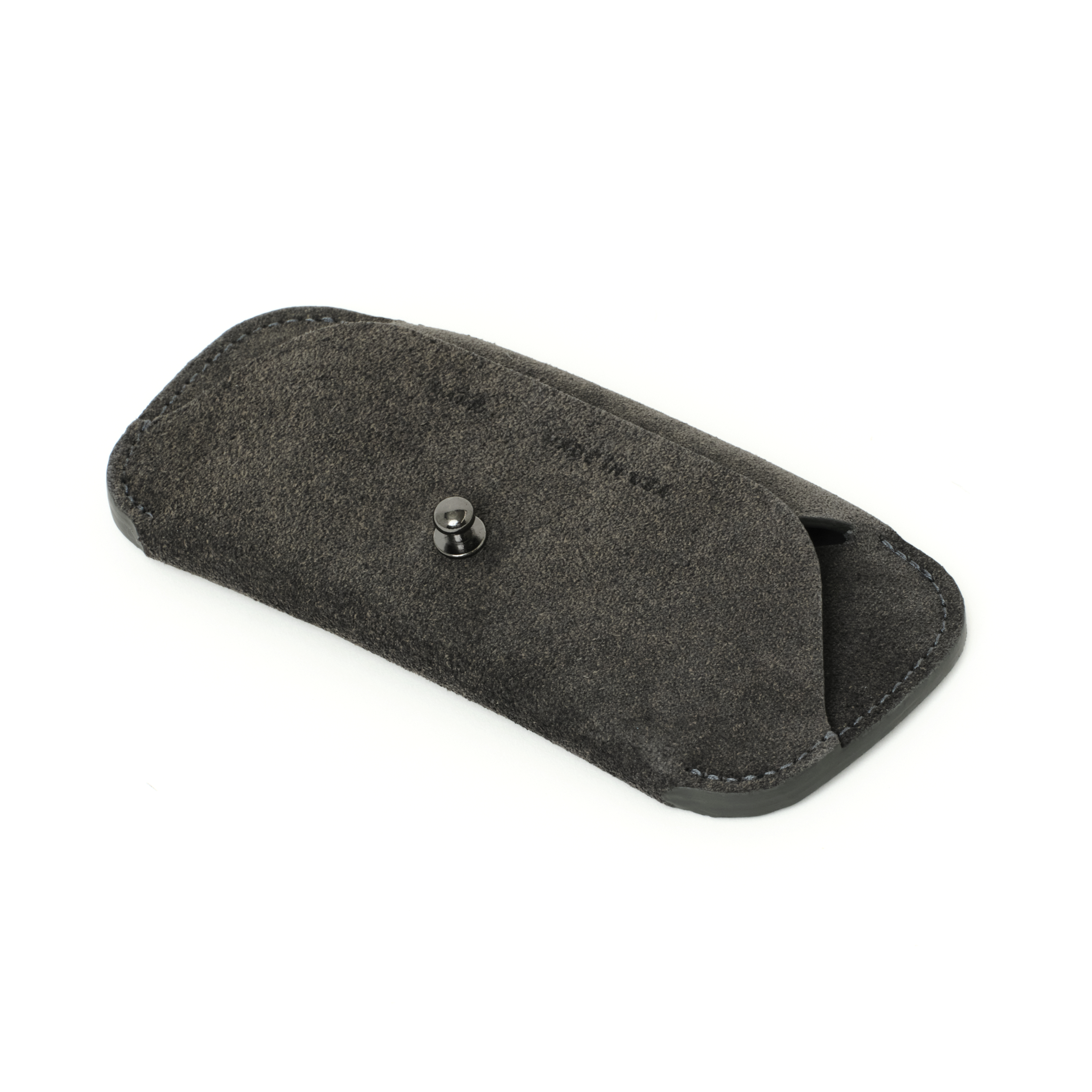 Angled side view of the MAKR Eyewear Sleeve V3 in Lead Horween suede.
