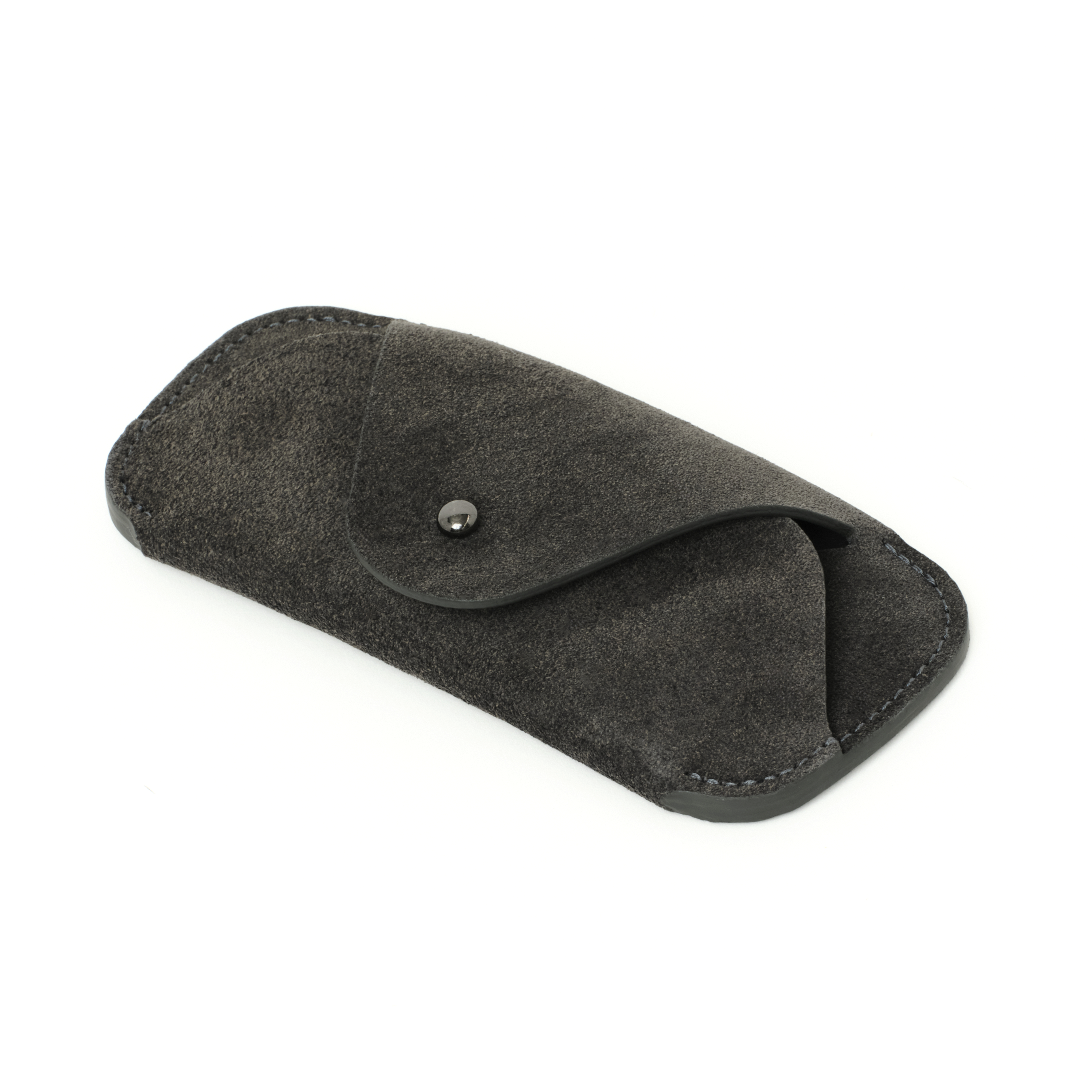 Angled view of the MAKR Eyewear Sleeve V3 in Lead Horween suede.