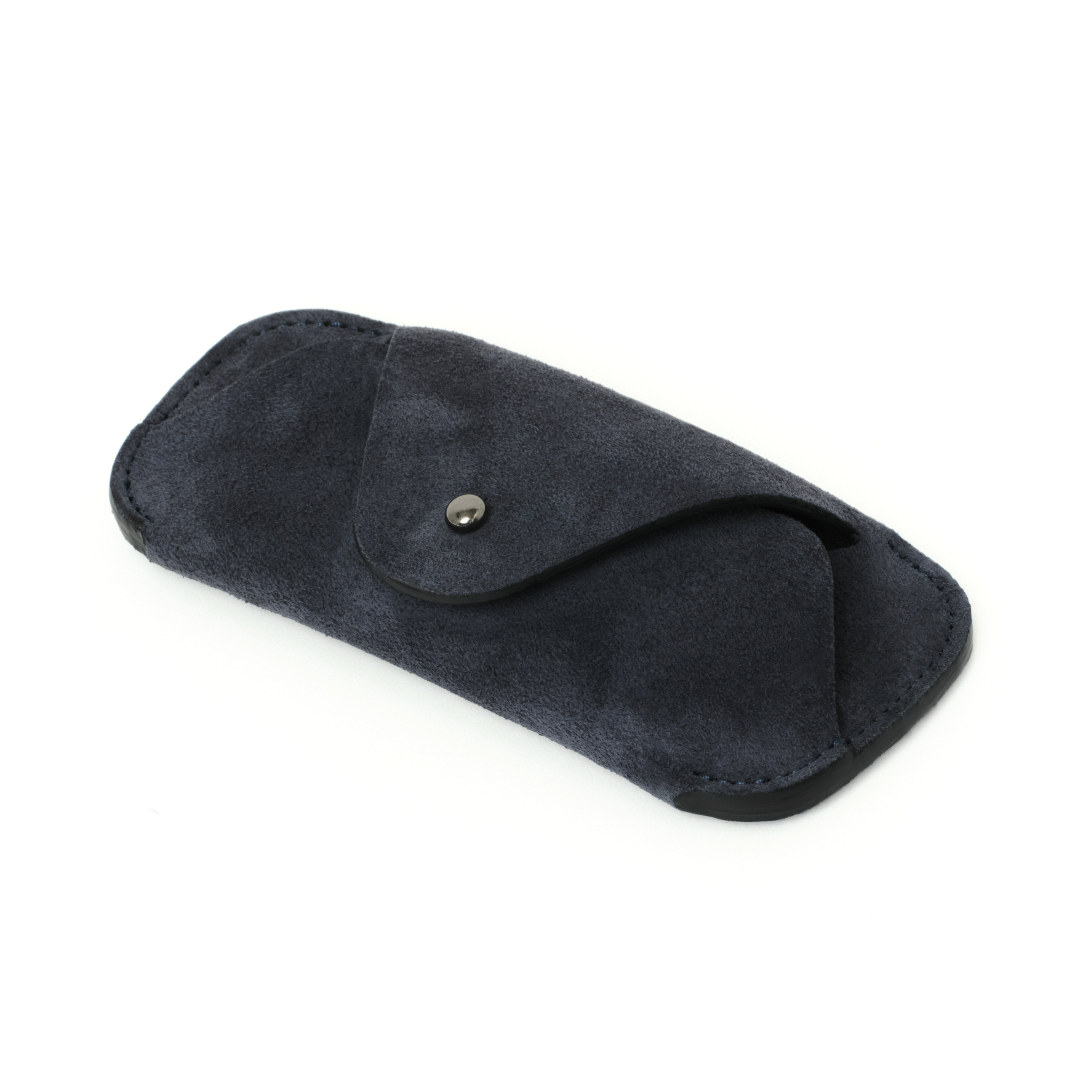 Angled view of the MAKR Eyewear Sleeve V3 in Navy Horween suede.