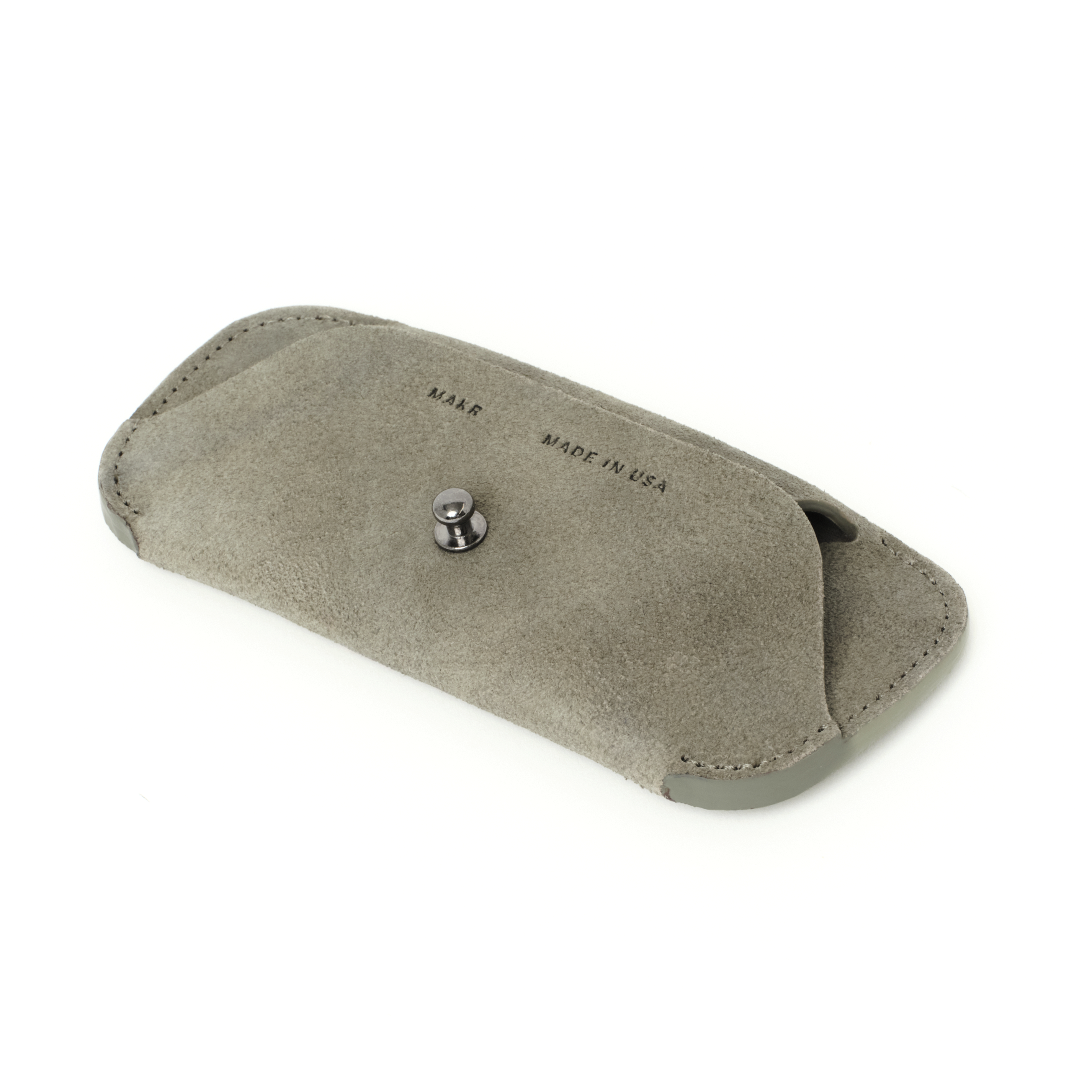 Angled side view of the MAKR Eyewear Sleeve V3 in Stone Horween suede.