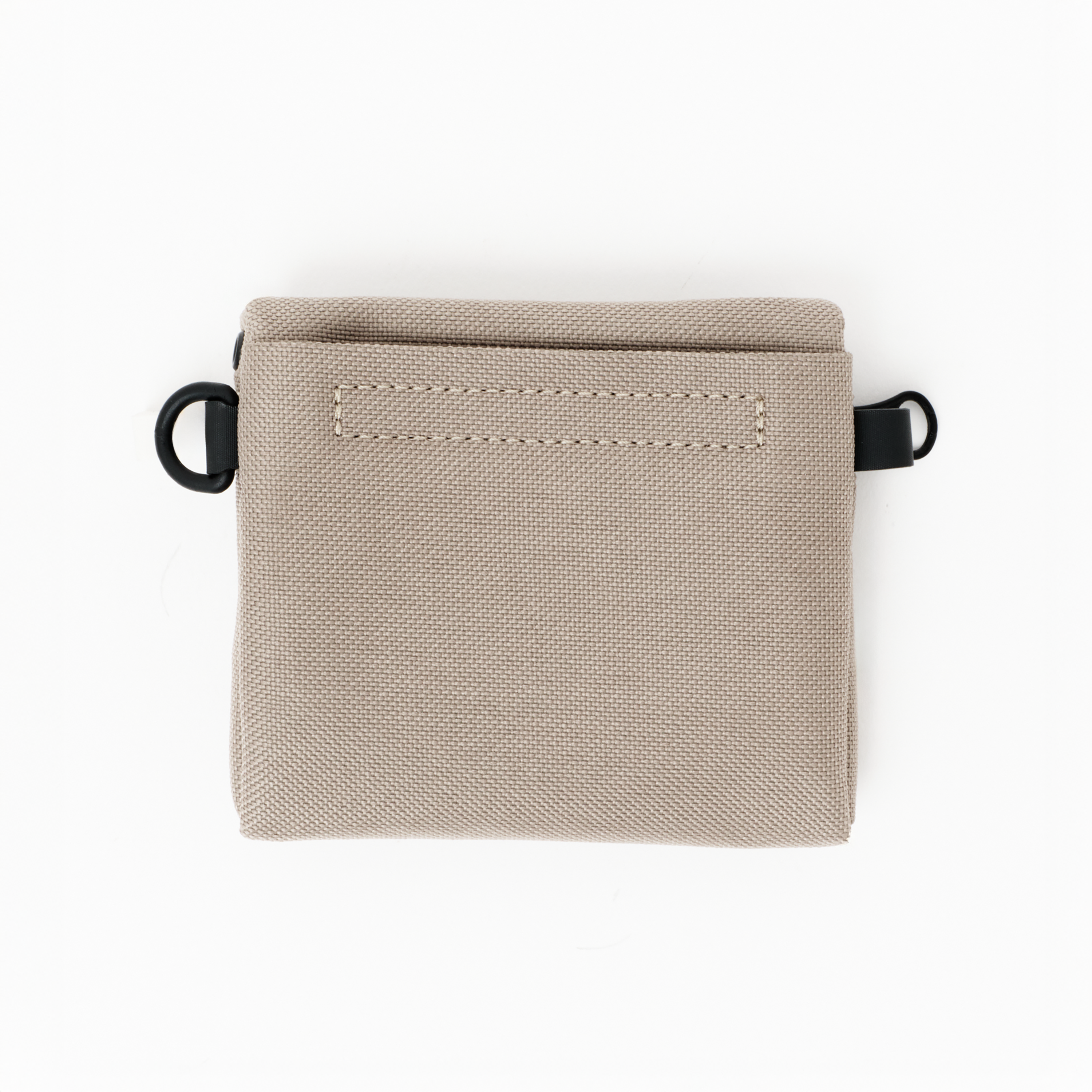 Back of the MAKR Bracket Pouch/Wallet in Sand bonded poly duck.
