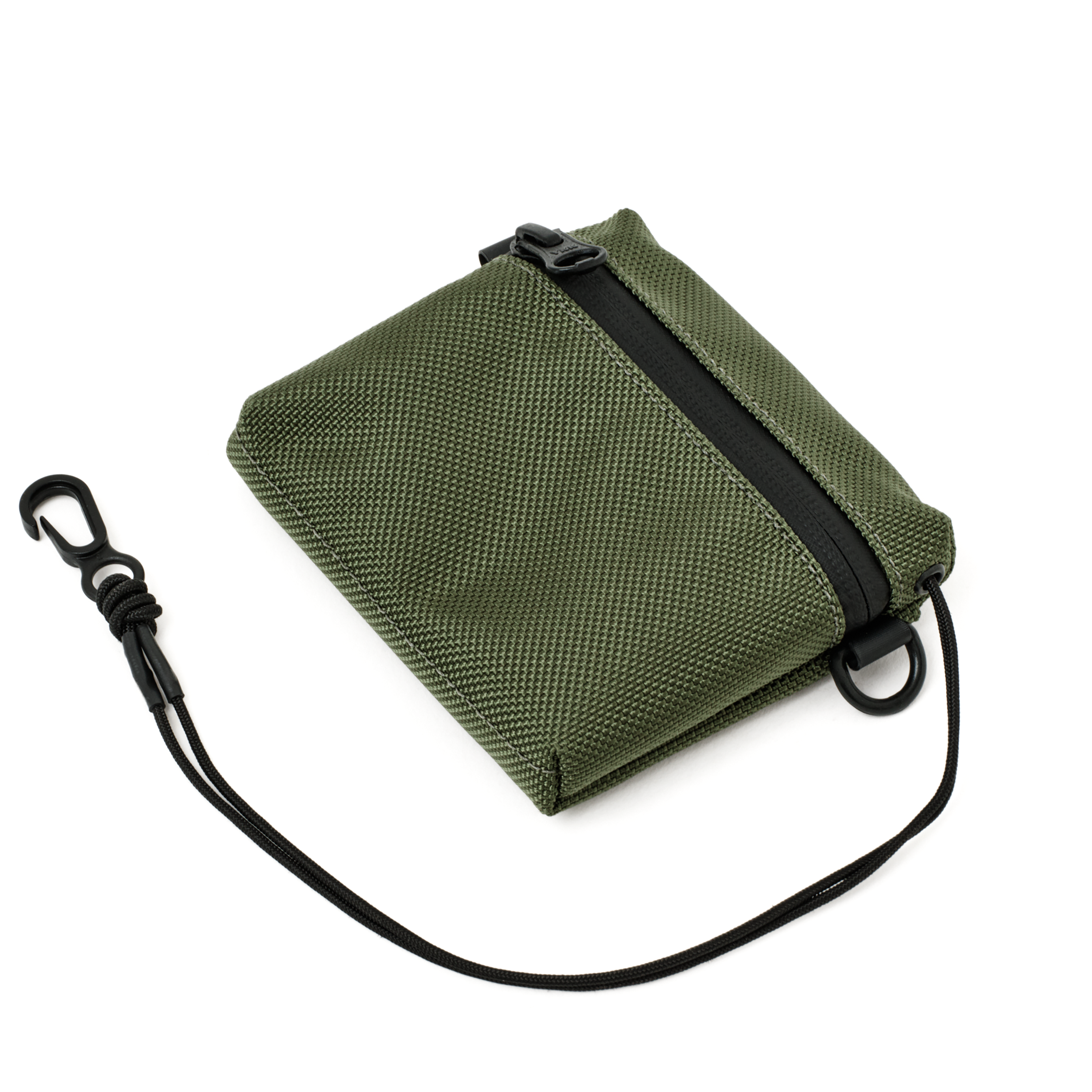 The MAKR Bracket Pouch/Wallet in Fern 1680 ballistic nylon, shown at an angle.