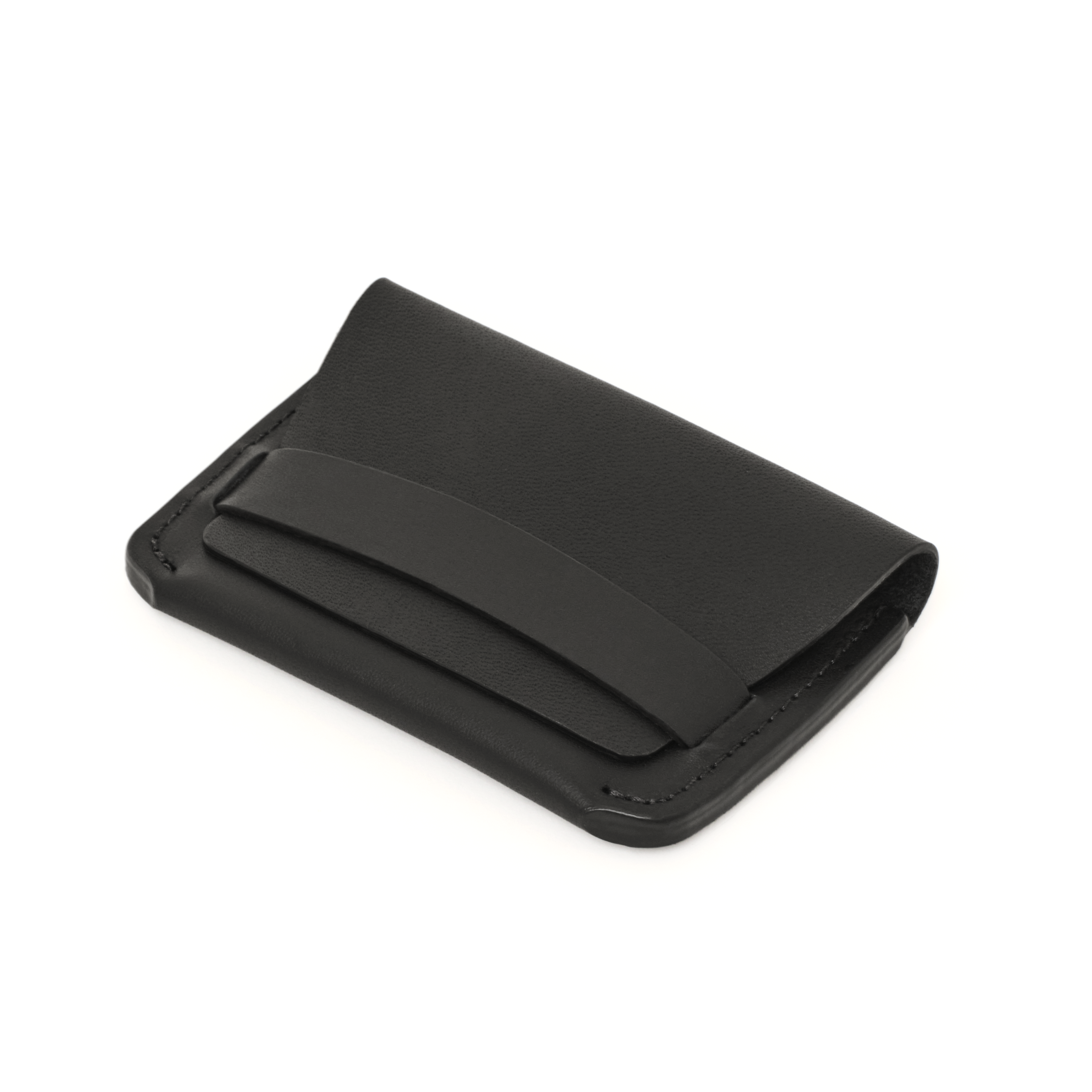 The MAKR Flap Wallet PLUS V2 in Black Horween Latigo leather, shown at an angle.