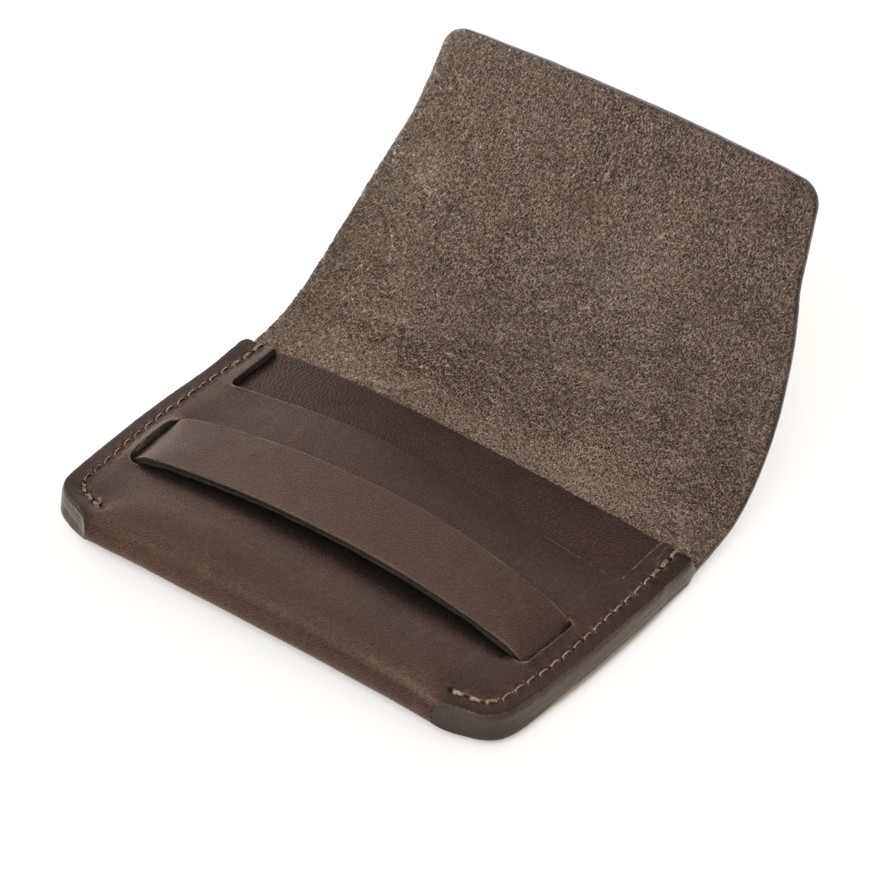 Angled view of the MAKR Flap Wallet PLUS V2 in Brown Horween Latigo leather, open.