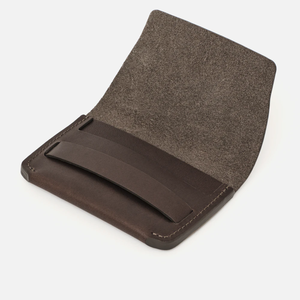 Angled view of the MAKR Flap Wallet PLUS V2 in Brown Horween Latigo leather, open.