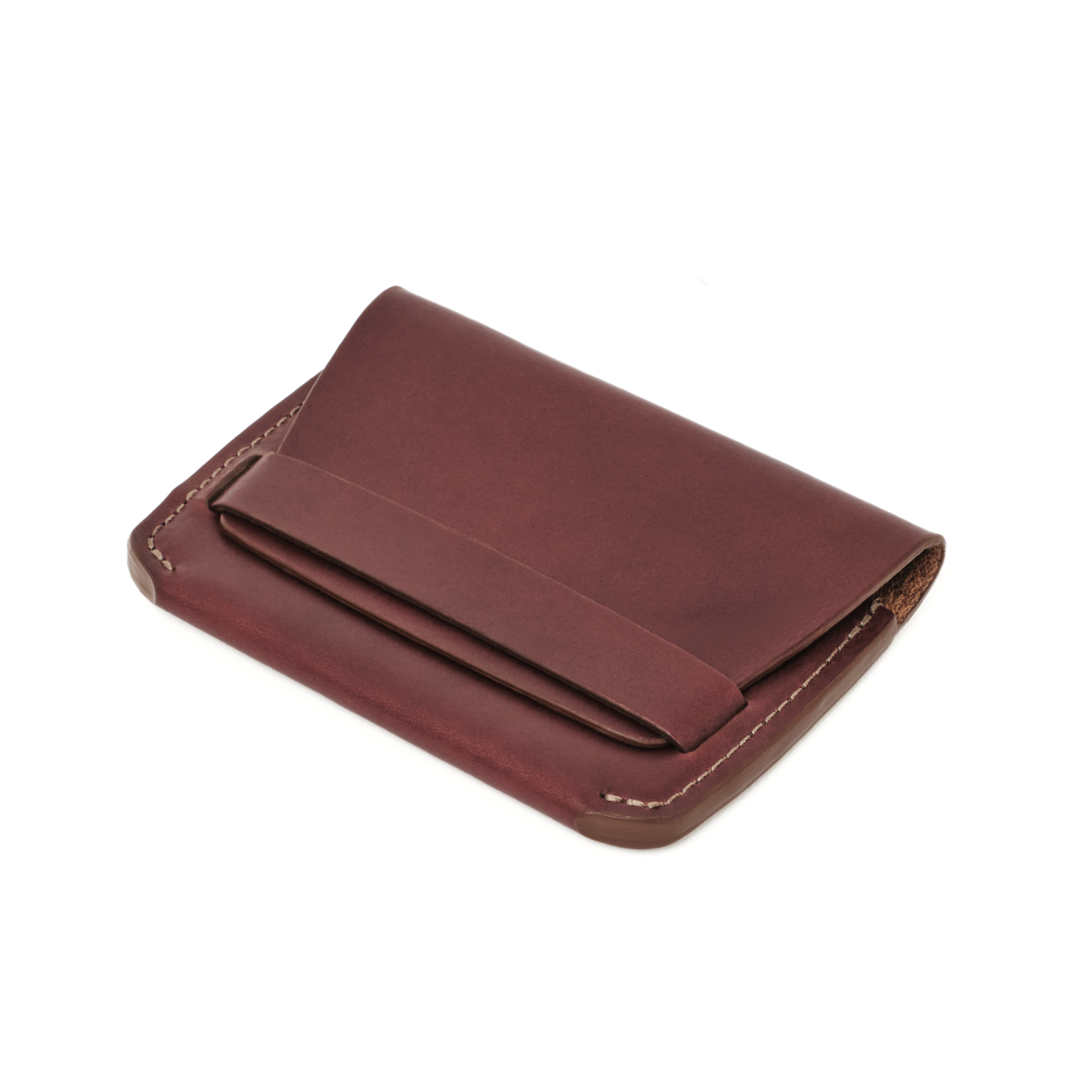The MAKR Flap Wallet PLUS V2 in Ox Blood Horween Chromexcel leather, shown at an angle.
