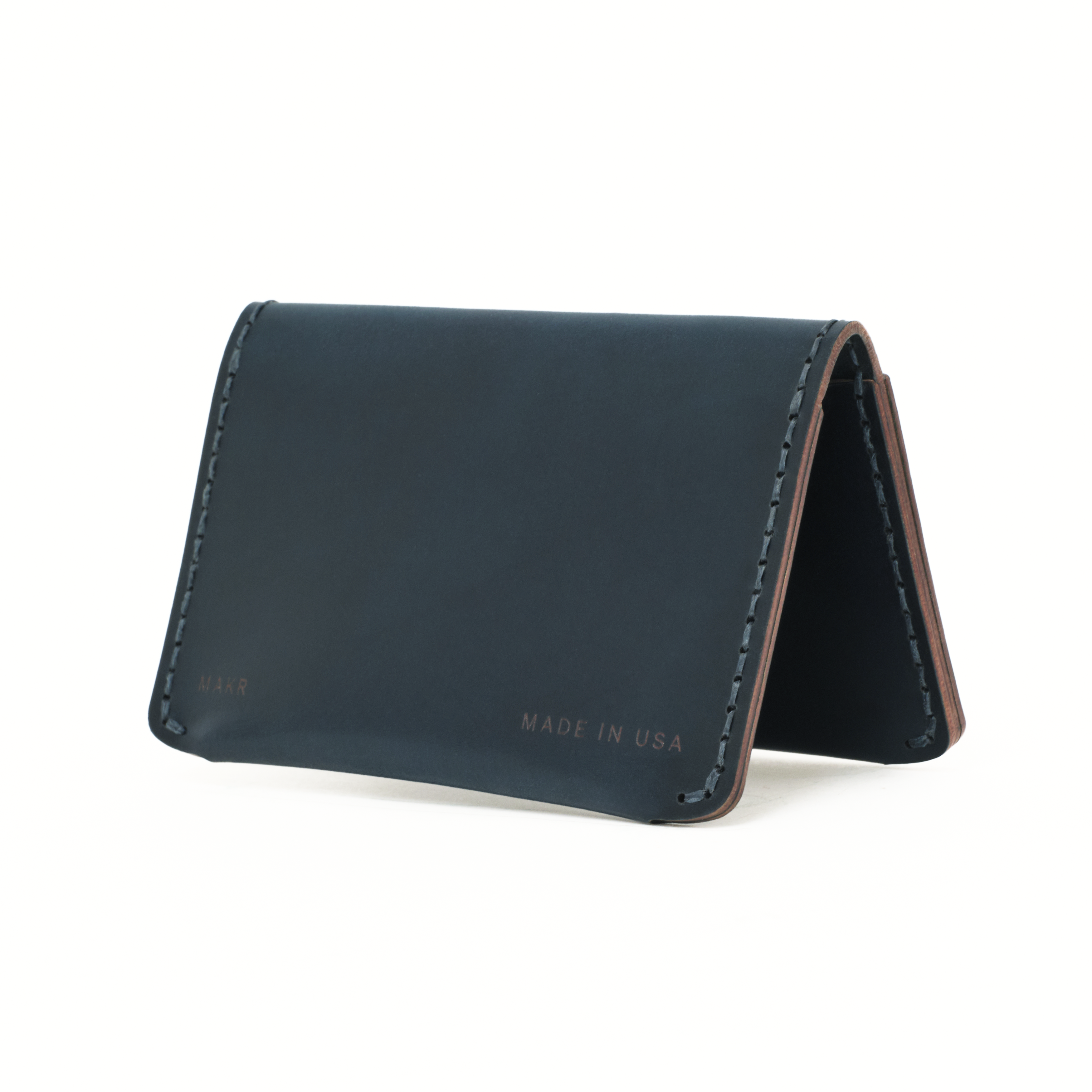 Angled back view of the MAKR Horizon Three V2 (HS) in Navy Horween Shell Cordovan.