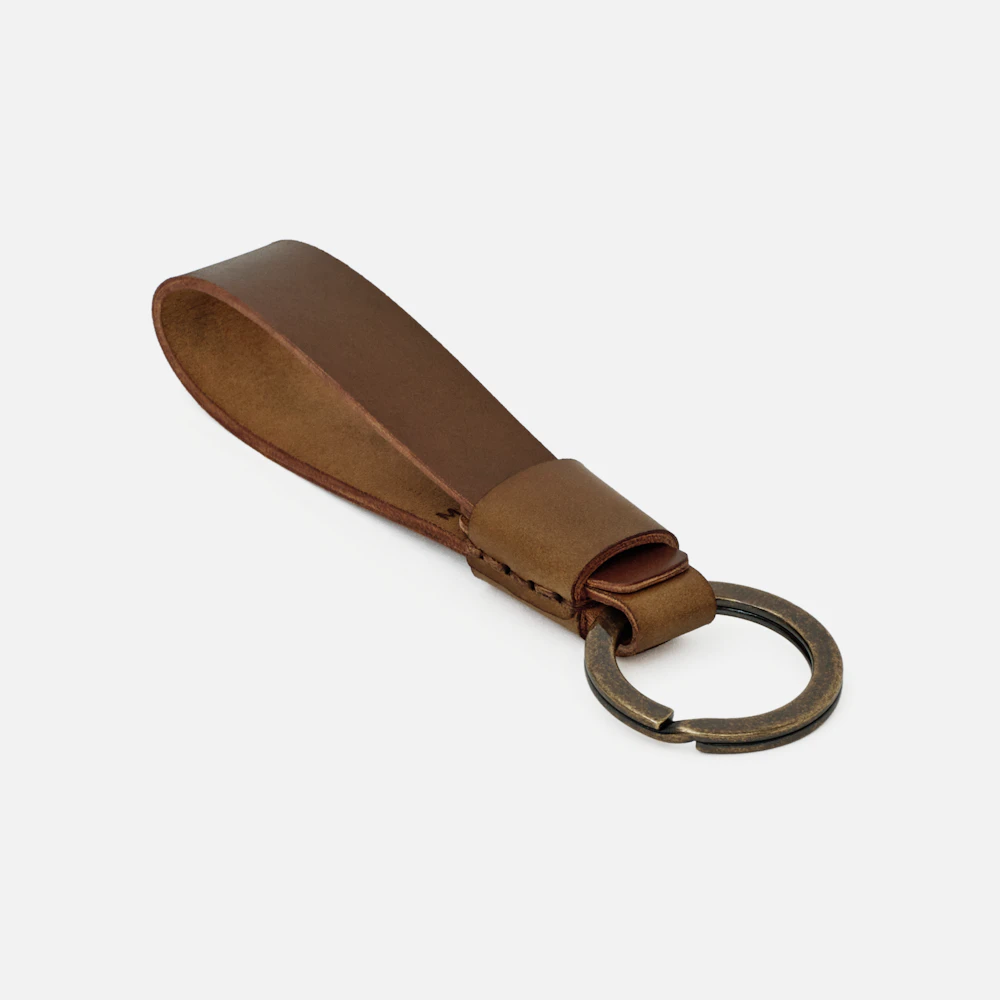 MAKR Overlap Keychain in bourbon shell cordovan, angled front view with key ring.