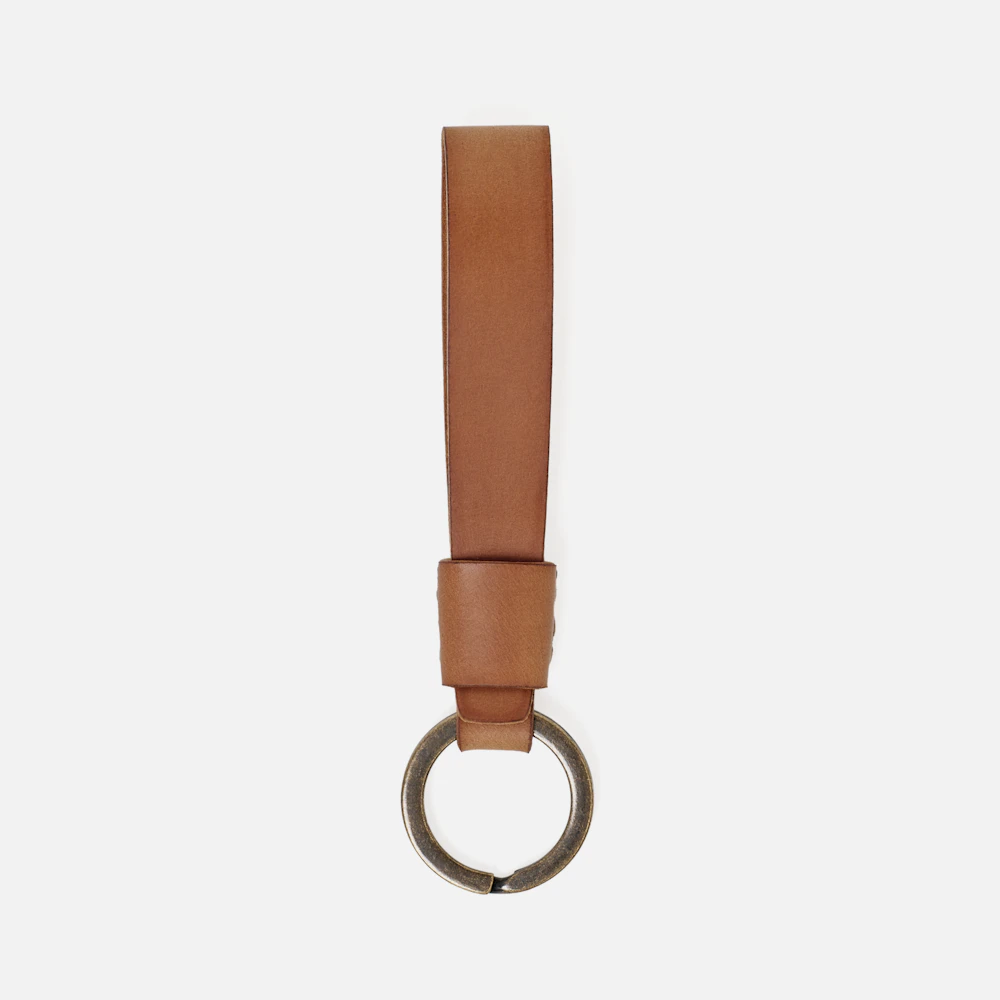 Top view of the MAKR Overlap Keychain, natural shell cordovan loop with key ring.