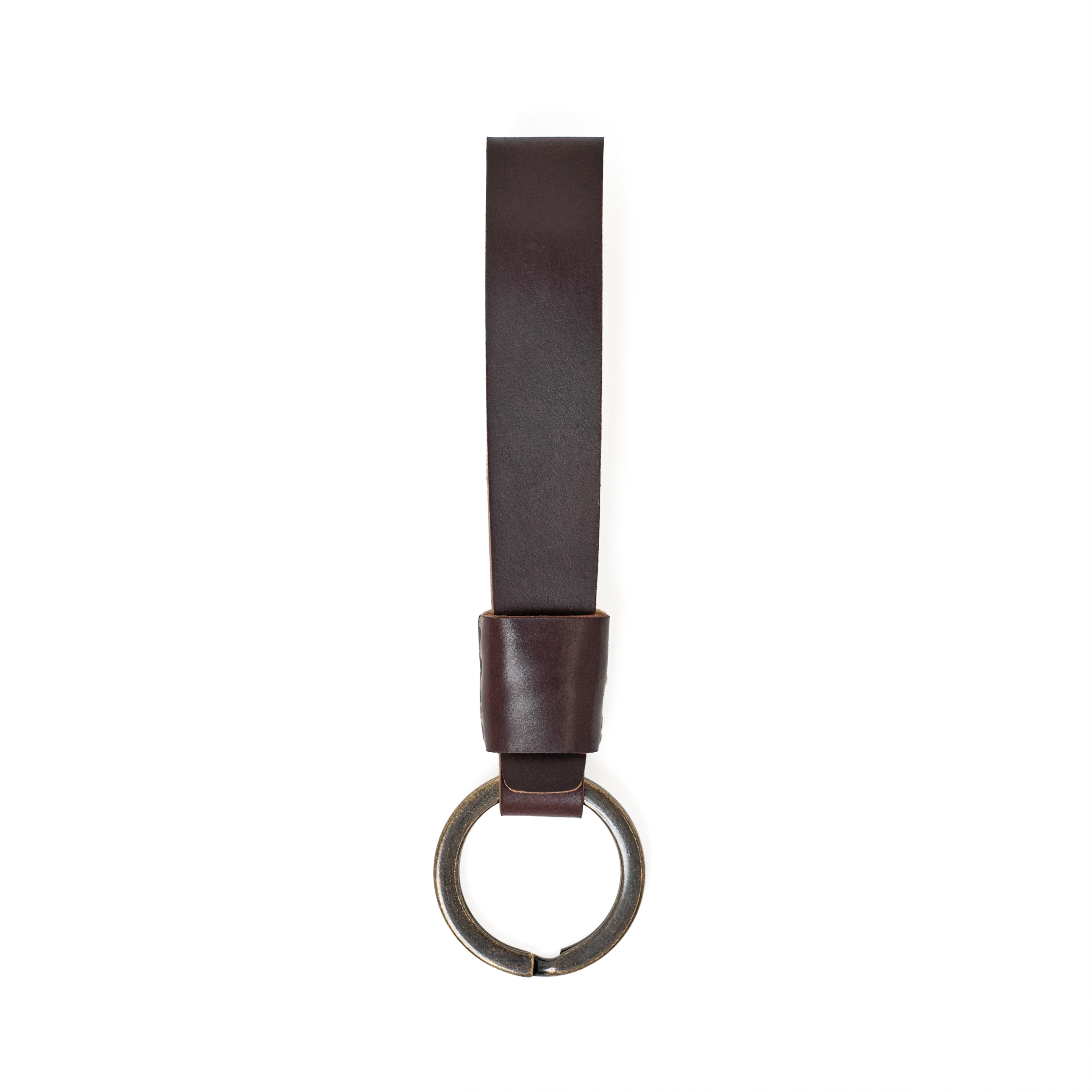 Top view of the MAKR Overlap Keychain, ox blood shell cordovan loop with key ring.