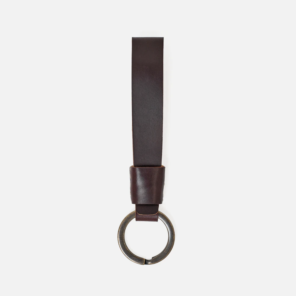 Top view of the MAKR Overlap Keychain, ox blood shell cordovan loop with key ring.