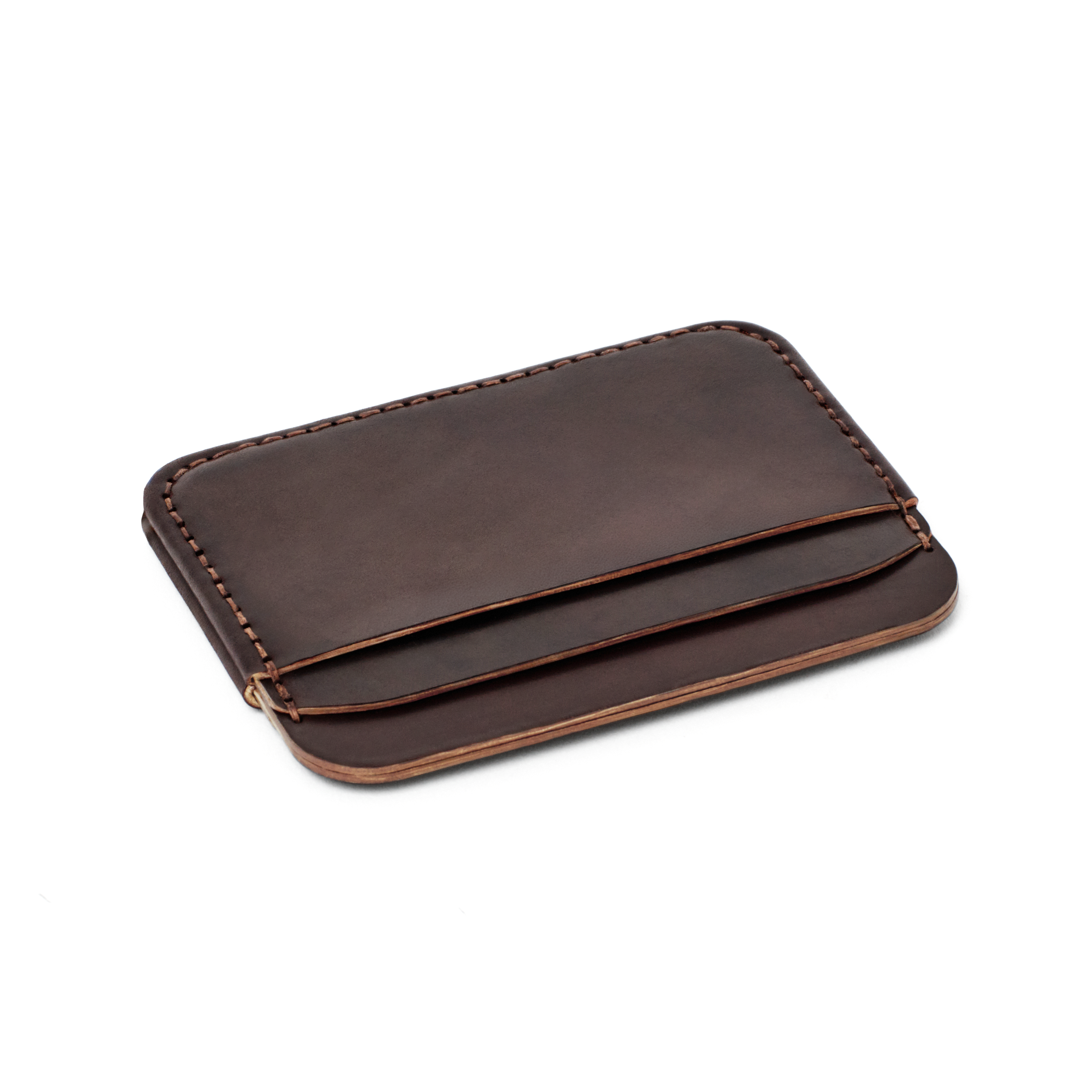 The MAKR Round Luxe PLUS Wallet in Ox Blood Horween Shell Cordovan, shown at an angle.