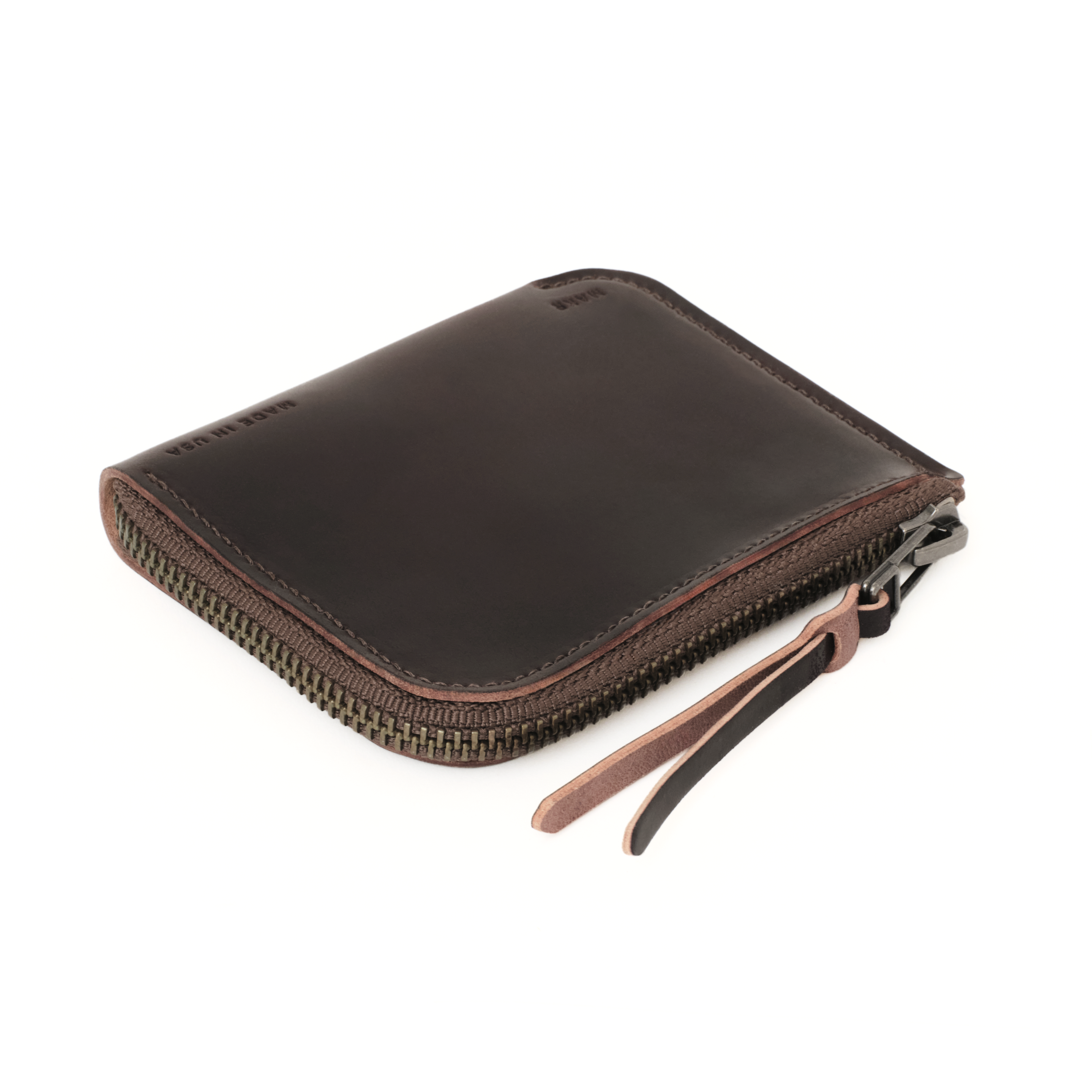 The MAKR Cordovan Zip Luxe V2 Wallet in Ox Blood Horween Shell Cordovan, shown at an angle.
