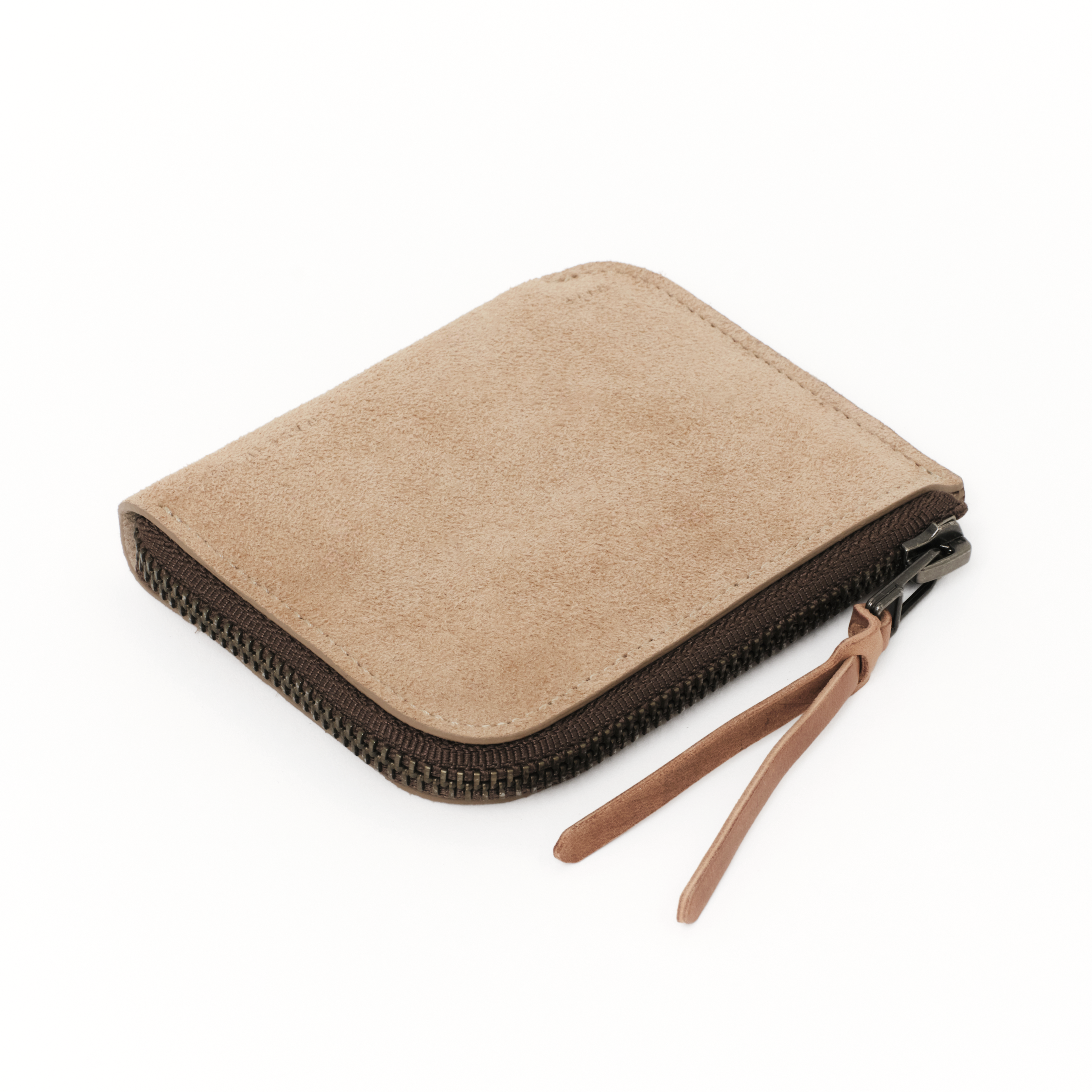 The MAKR Zip Luxe V2 Wallet in Khaki Horween suede, shown at an angle.