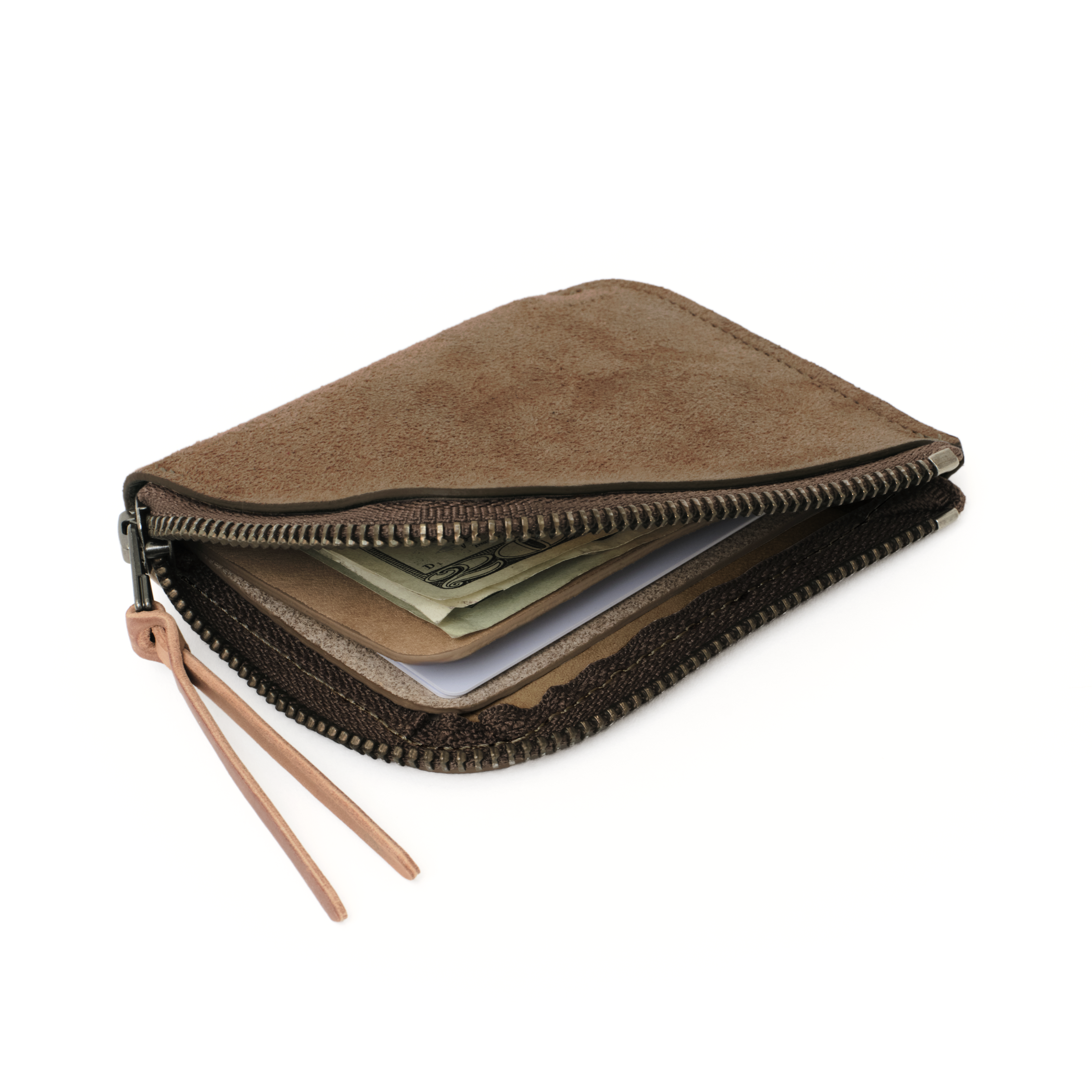 Angled view of the MAKR Zip Luxe V2 Wallet in Shale Horween suede, unzipped.