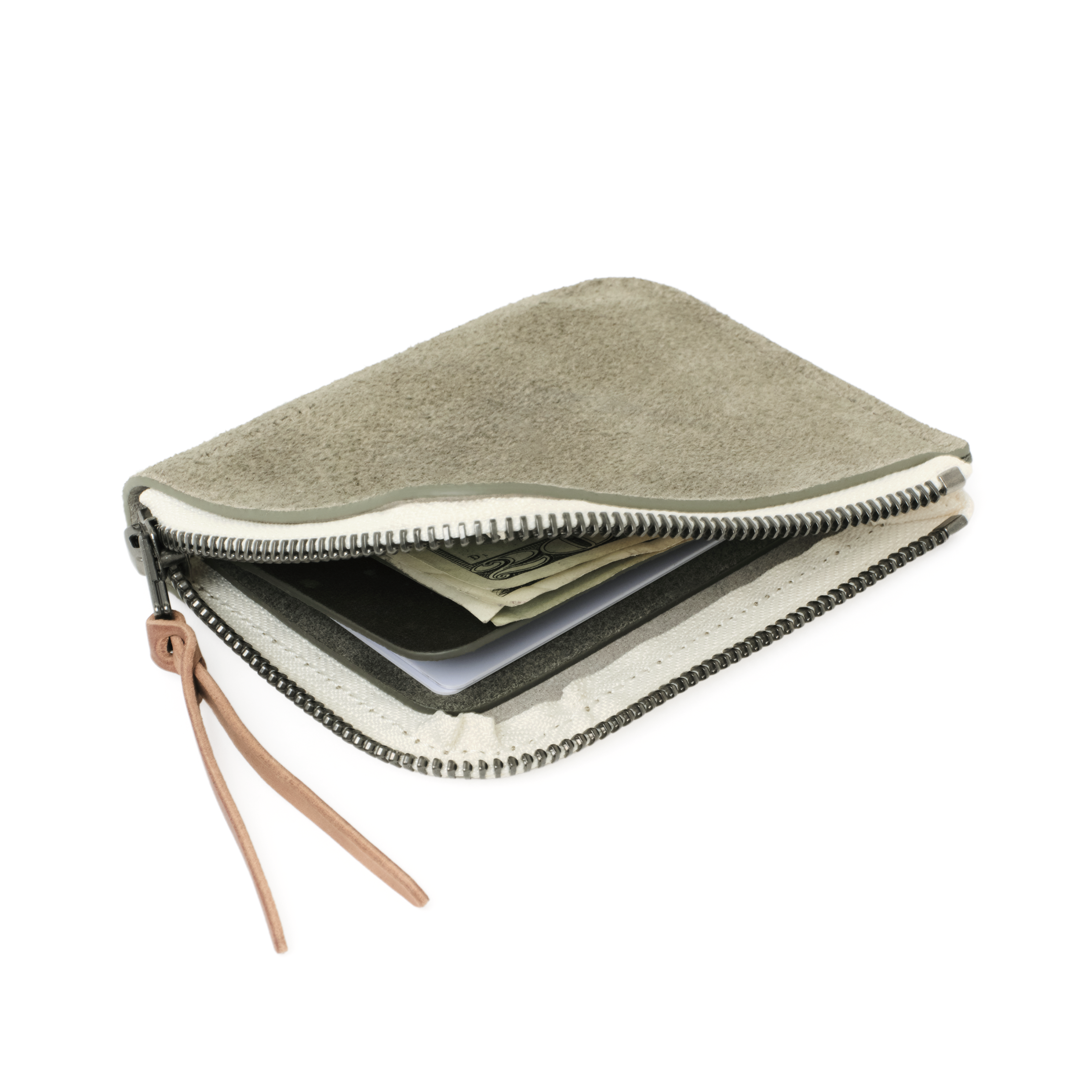 Angled view of the MAKR Zip Luxe V2 Wallet in Stone Horween suede, unzipped.