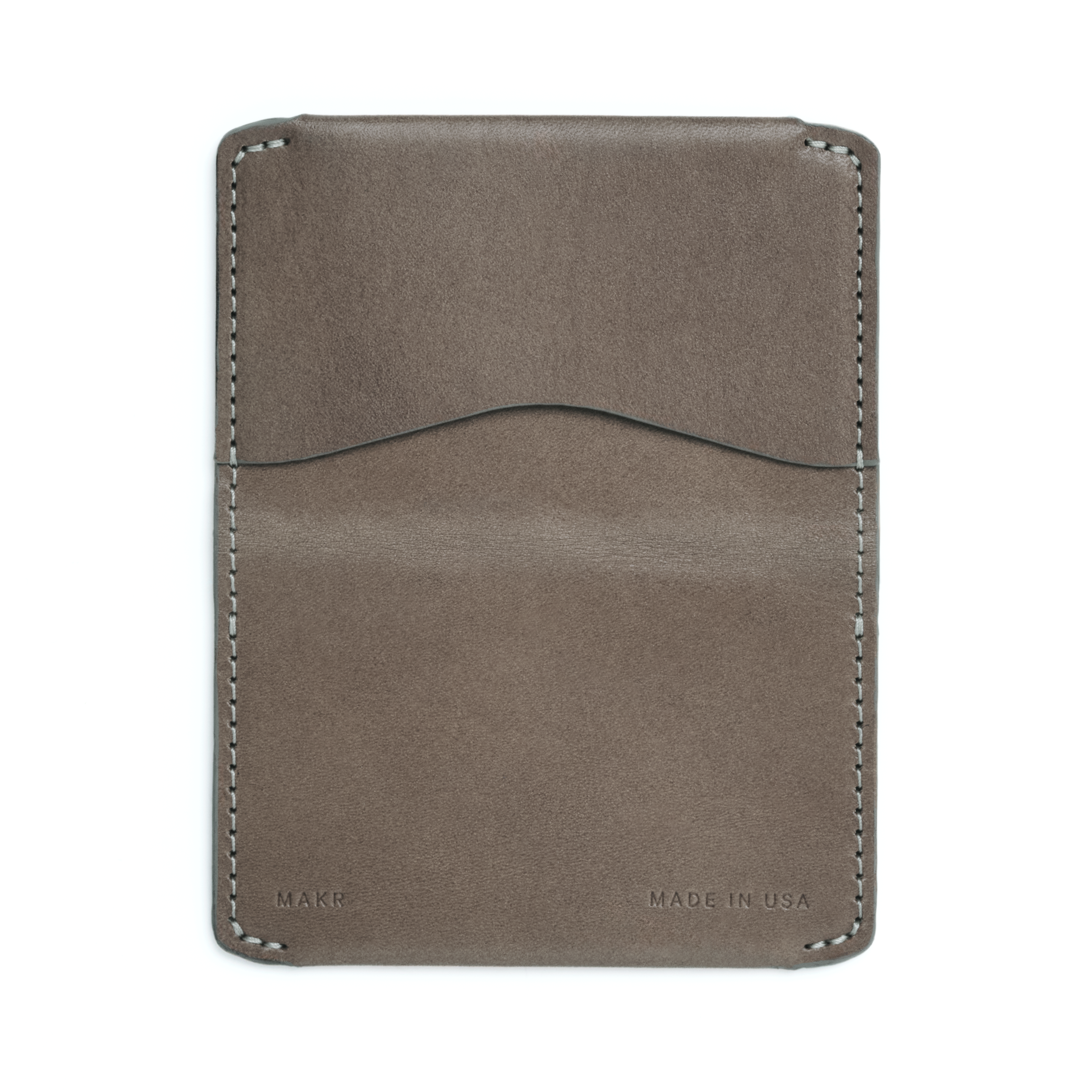 The MAKR Horizon Three V2 Wallet in Charcoal Horween leather, unfolded to show the inside pockets.