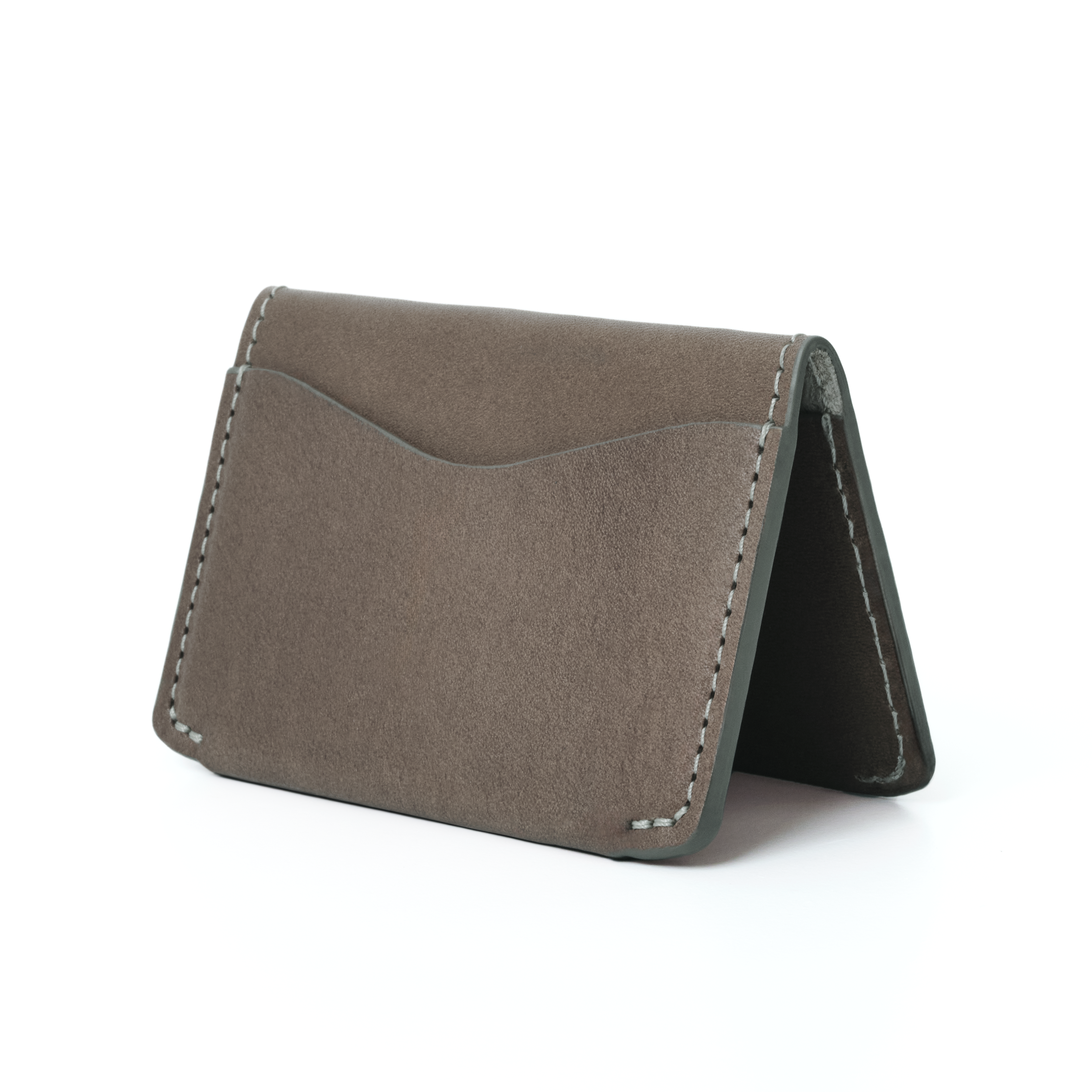 The MAKR Horizon Three V2 Wallet in Charcoal Horween leather, shown at an angle.
