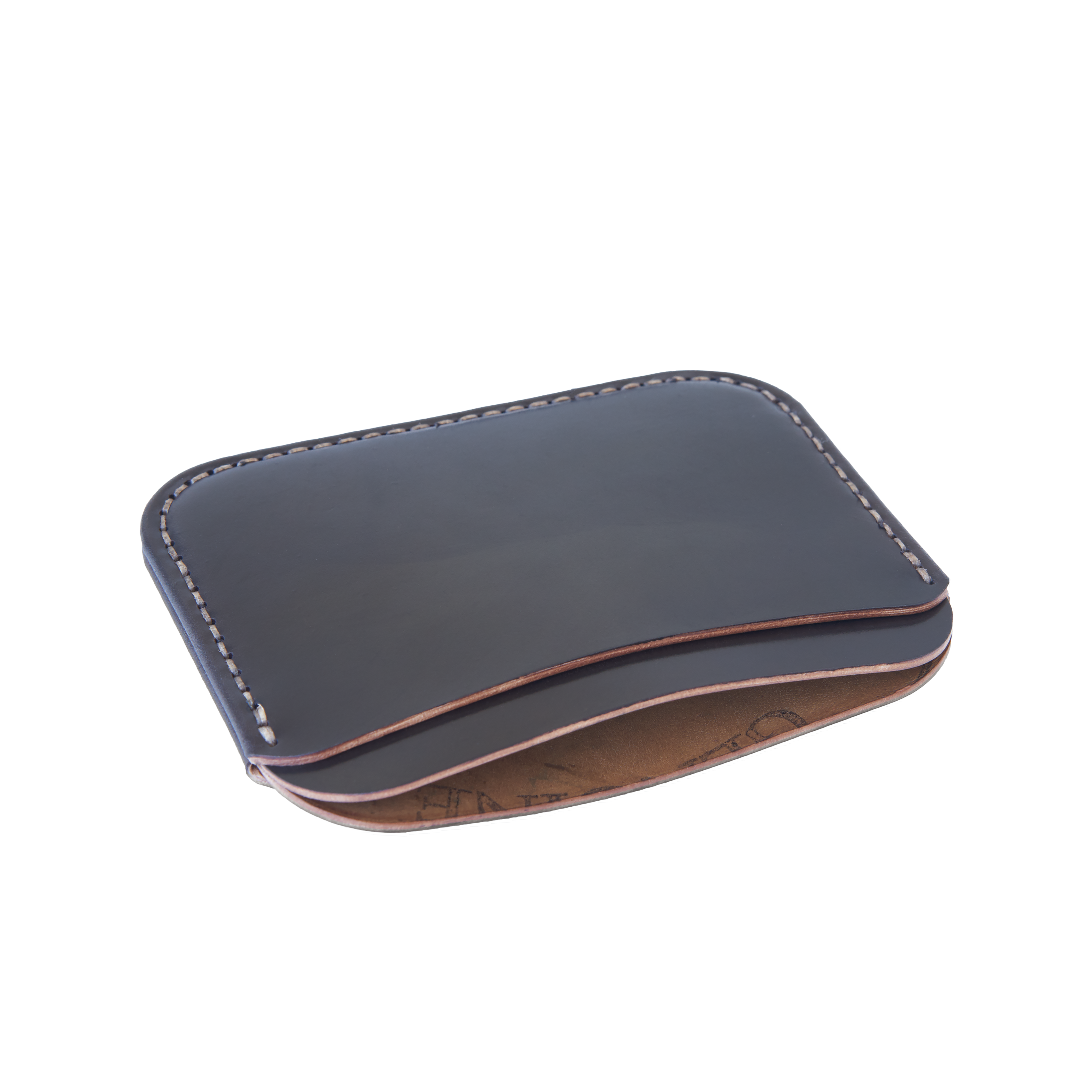 The MAKR Round Luxe Wallet in Dark Cognac Horween Shell Cordovan, shown at an angle.