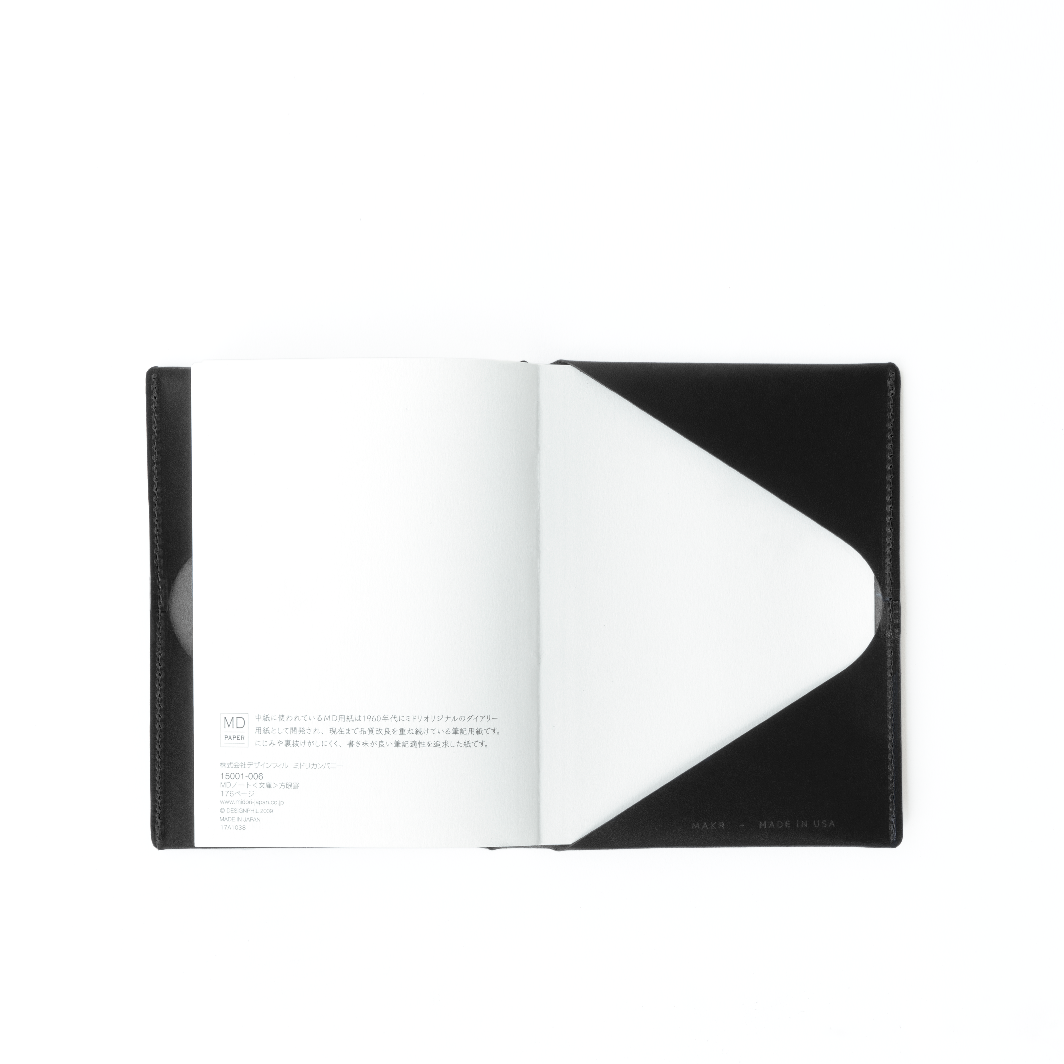 The MAKR Midori Cover SM (A6) in Black Horween Latigo leather, opened to show the notebook and inside cover.