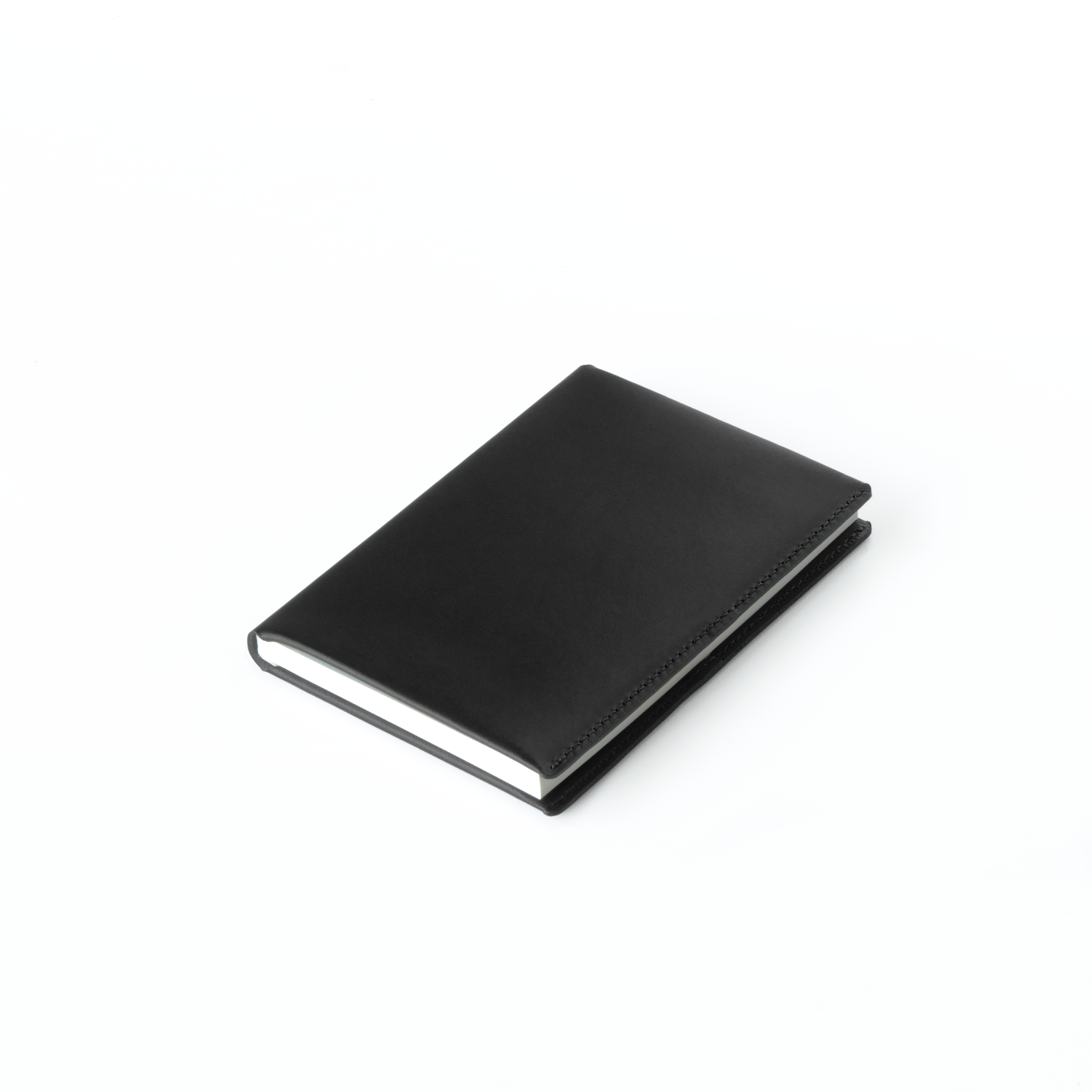 The MAKR Midori Cover SM (A6) in Black Horween Latigo leather, shown at an angle.